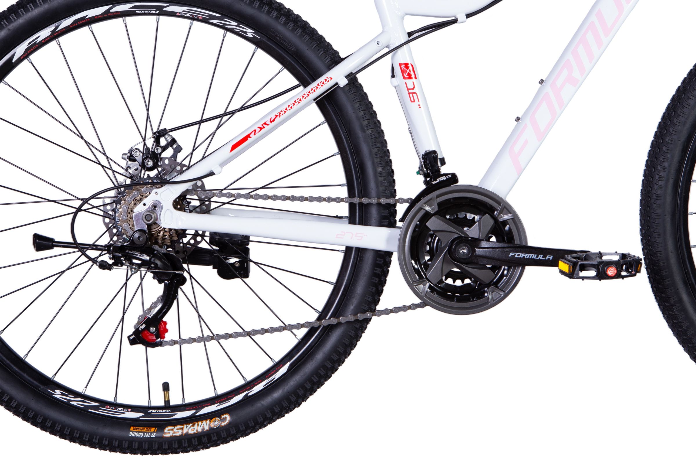Valkoinen maastopyörä ja sen vaihteistot.
